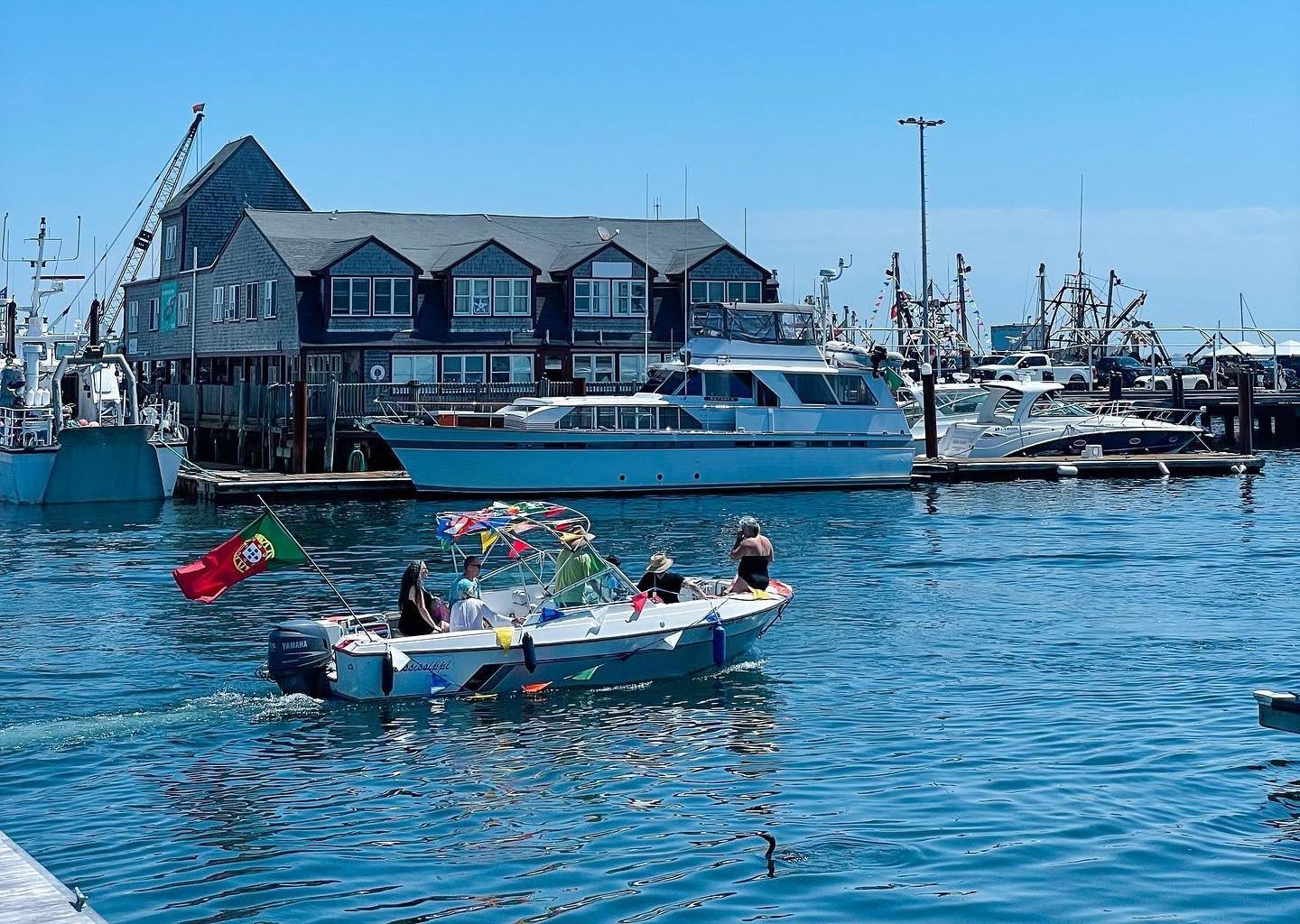 Boat flying Portuguese Flag at Provincetown Marina